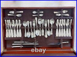 Cutlery canteen in wooden table, 138 piece set, leather top with gold inlay