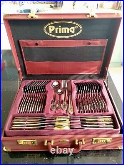 Prima 70 piece cutlery set stainless steel with gold trim. Unused. Beautiful