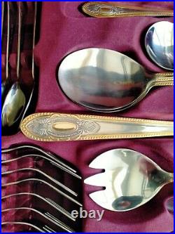 Prima 70 piece cutlery set stainless steel with gold trim. Unused. Beautiful